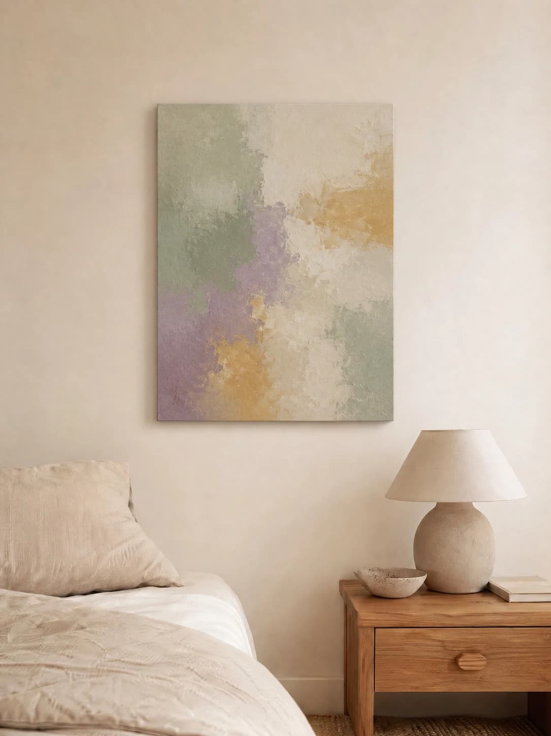 Unframed sage and lavender abstract canvas on a soft linen bedroom wall