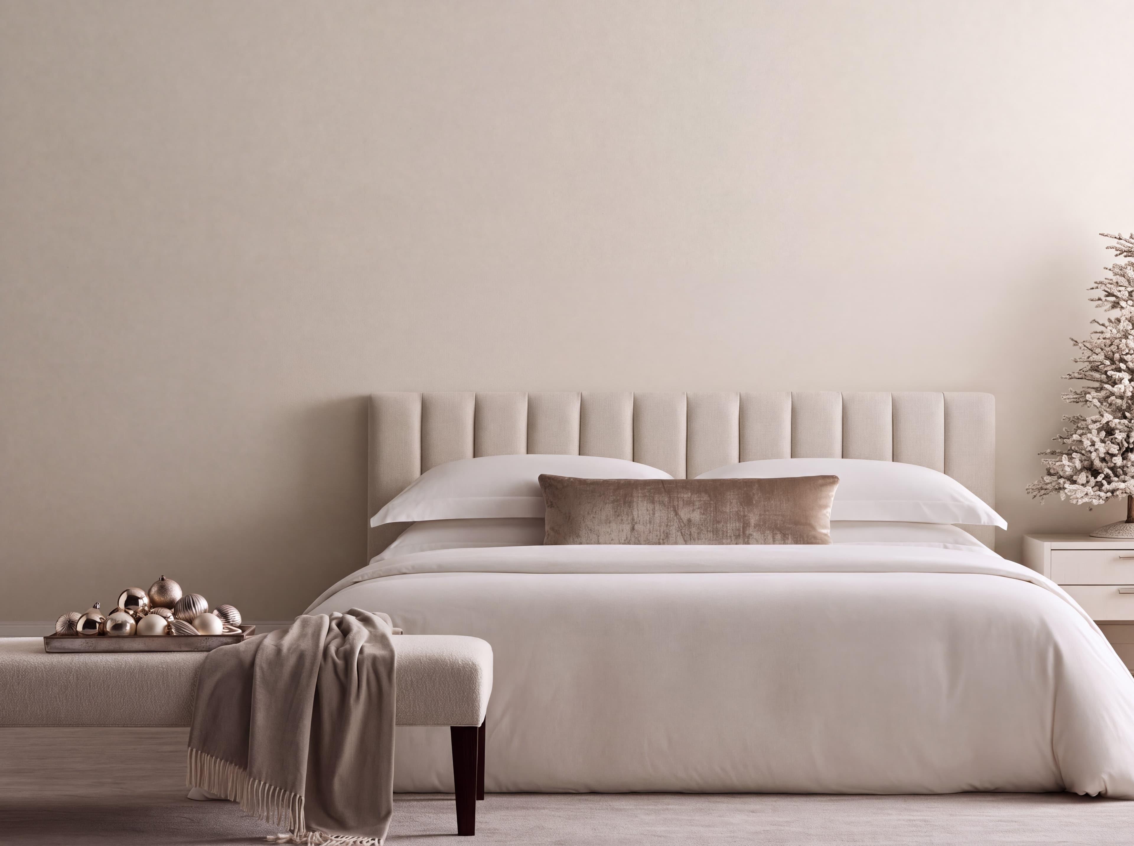 Luxury Christmas bedroom with an ivory wall, channel-tufted headboard, champagne ornaments, and flocked tree, ranked 20 among christmas mockups