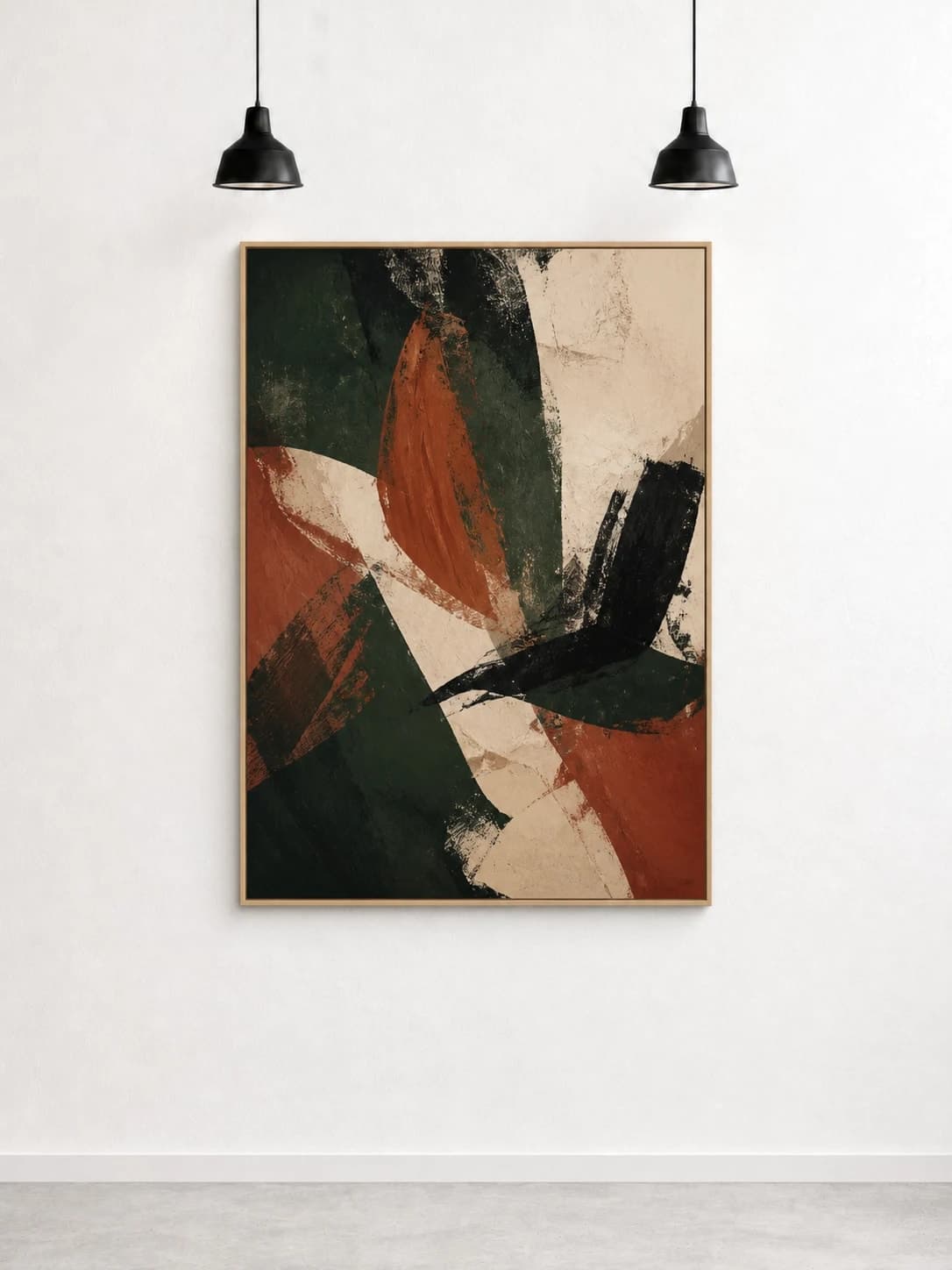 Forest green and clay abstract in an oak frame beneath black gallery pendant lights