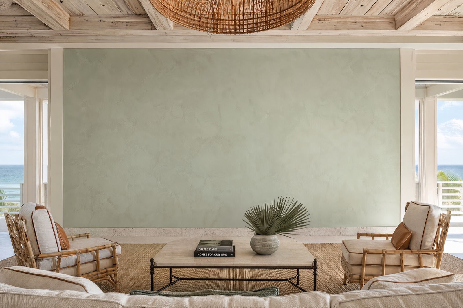 Silvery sage display wall beneath a pecky cypress ceiling in the Gulf Coast lounge room