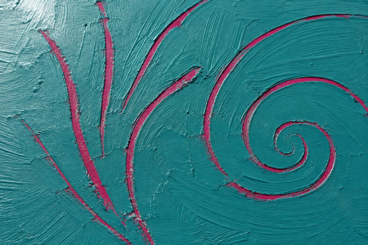 Close overhead process image of a teal acrylic layer at the dull skin-set stage with the first clean magenta sgraffito lines